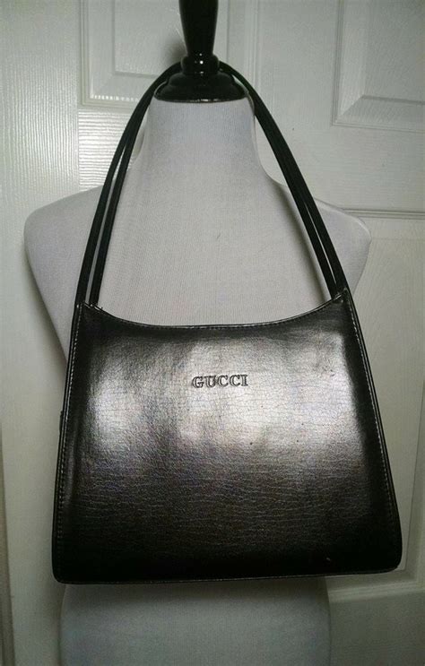 vintage faux black gucci handbag